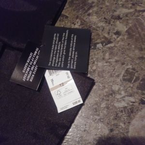 Two piece Black and White ladies suit.